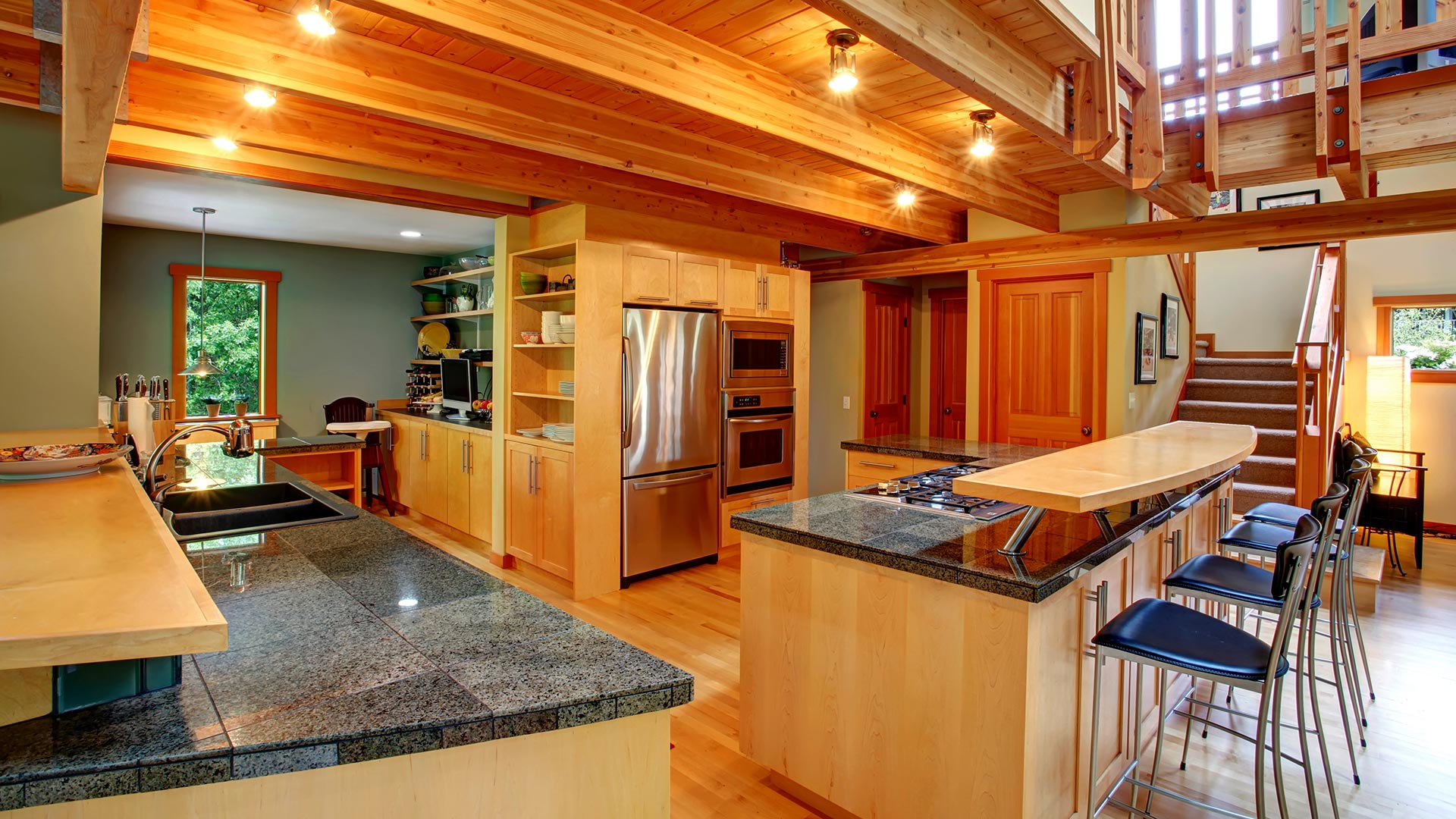 Luxury mountain home living room with timber frame architecture in Pine Mountain Club