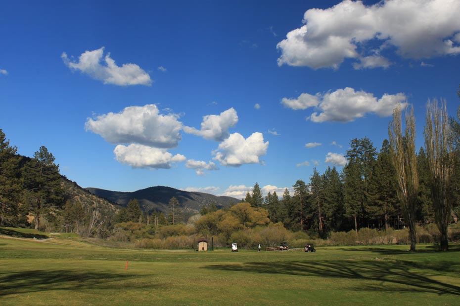 Fairway under clouds at Pine Mountain Club golf course