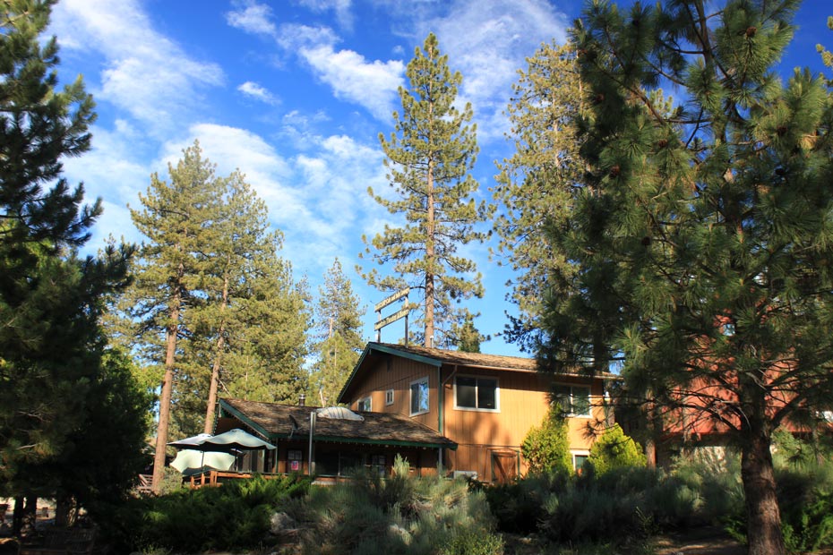 Residential-style village building in Pine Mountain Club surrounded by autumn trees