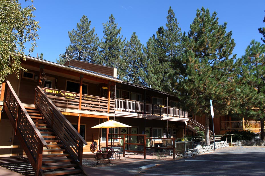 Two-story Pine Mountain Club village shops with exterior stairways and balconies