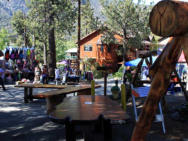 Crowds and vendor booths at the Lilac Festival in Pine Mountain Village spring community event